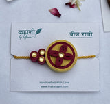 Floral Seed Paper Rakhi – Yellow & Maroon | Eco-Friendly with Roli Chawal & Coco Disc
